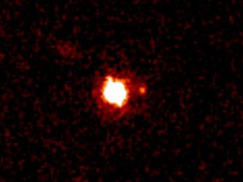 Eris en zijn maan Dysnomia, gefotografeerd met de Keck Telescope op Hawaii
