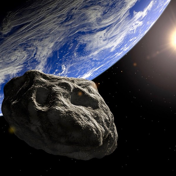Artist impressie van een grote asteroïde zoals 7335, die langs de Aarde scheert.