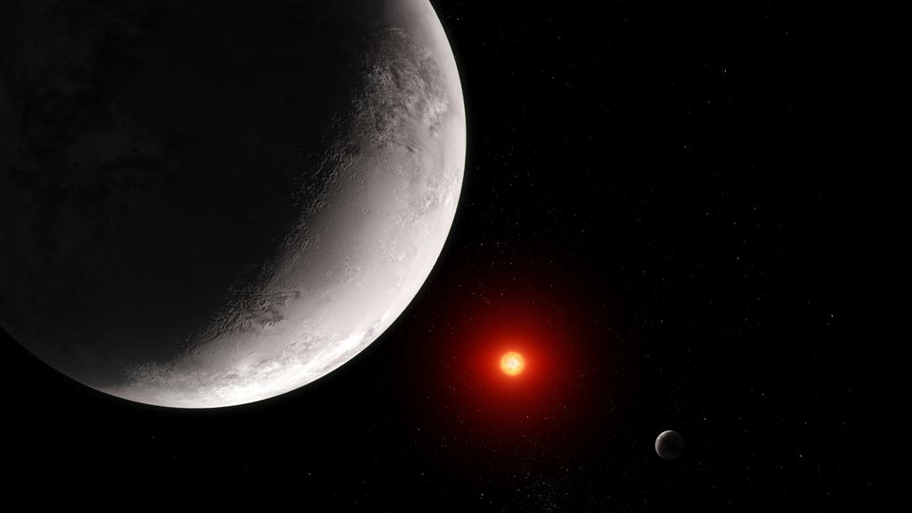 Een illustratie van TRAPPIST-1 C, met TRAPPIST-1 B en de gastster TRAPPIST-1 op de achtergrond.