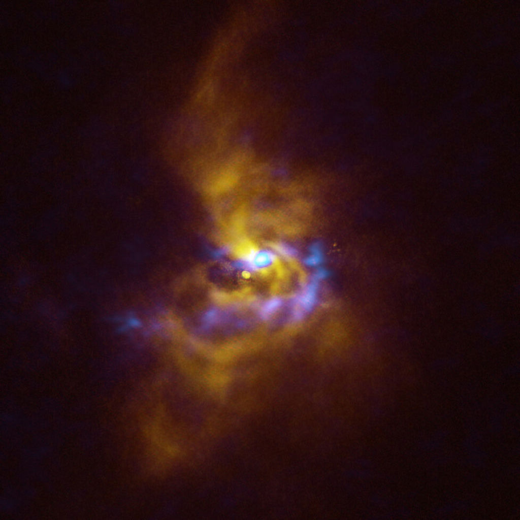 Deze composietafbeelding toont V960 Mon, een jonge ster op meer dan 5000 lichtjaar afstand in het sterrenbeeld Monoceros. 